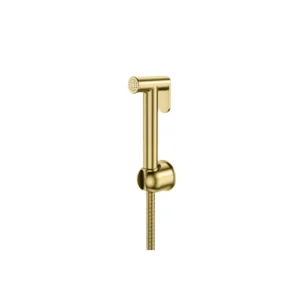 Scudo brushed brass wall-mounted douche spray kit with gun handle, spray handset, wall holder and hose, brushed brass finish and brass / stainless steel construction.